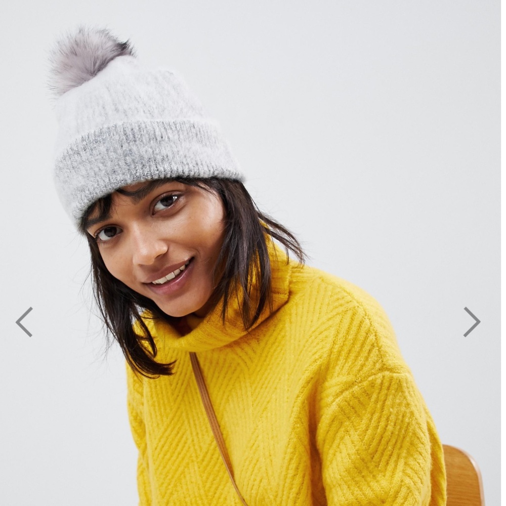 ASOS DESIGN fluffy beanie with faux fur pom